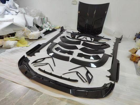 Para BMW XM Kit de cuerpo ancho de fibra de carbono XM Upgrades estilo RNG Fibra de carbono delantera del labio difusor de la rueda arco spoiler del capó cuerpo ancho