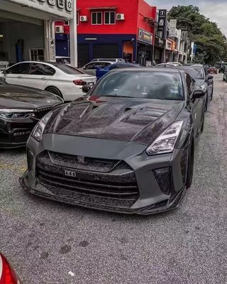 Para el Nissan GTR R35 Kit de cuerpo de fibra de carbono GTR mejorado Top Style de fibra de carbono delantero y trasero parachoques de la falda lateral